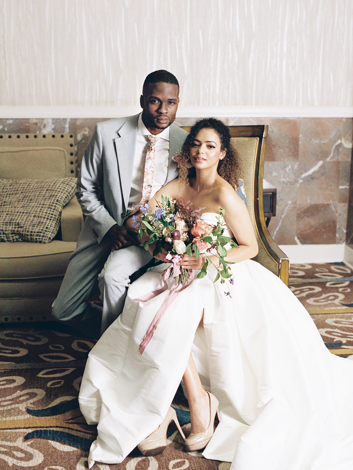 A stunning model couple pose at the Omni Resort in Amelia Island, Florida.