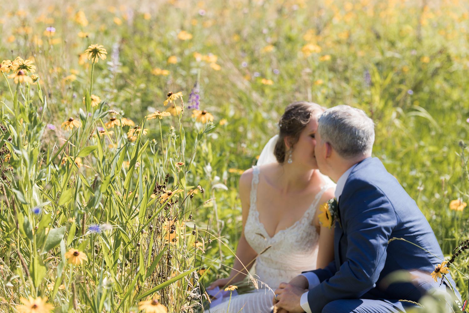 private session on the prairie bride groom wild flowers