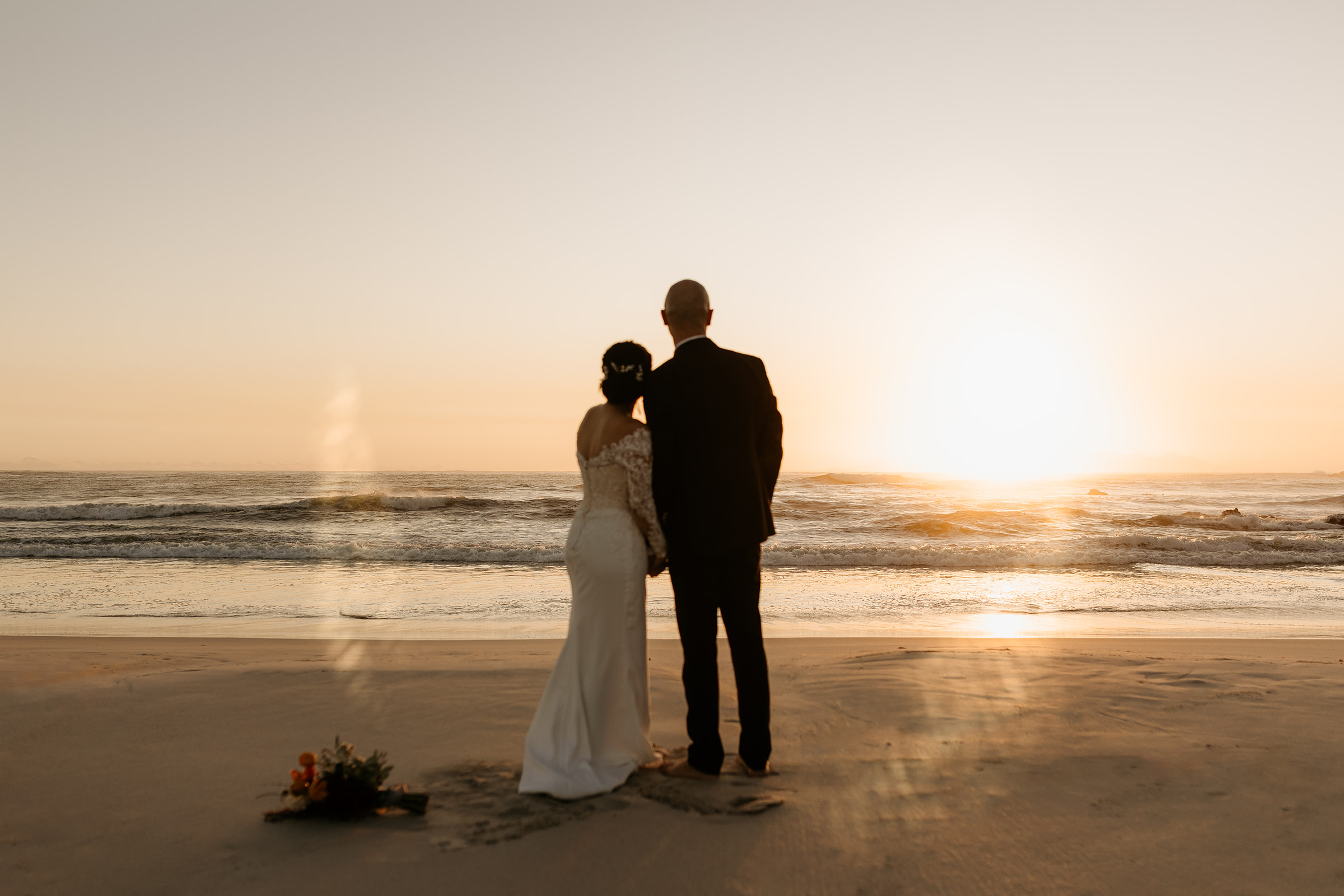 A couple who had an intimate wedding in Pringle Bay together on the beach at sunset