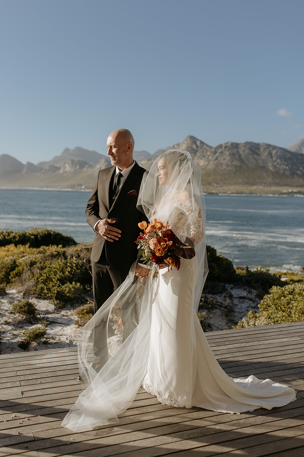 A bride and groom during their intimate wedding ceremony in Pringle Bay, Western Cape