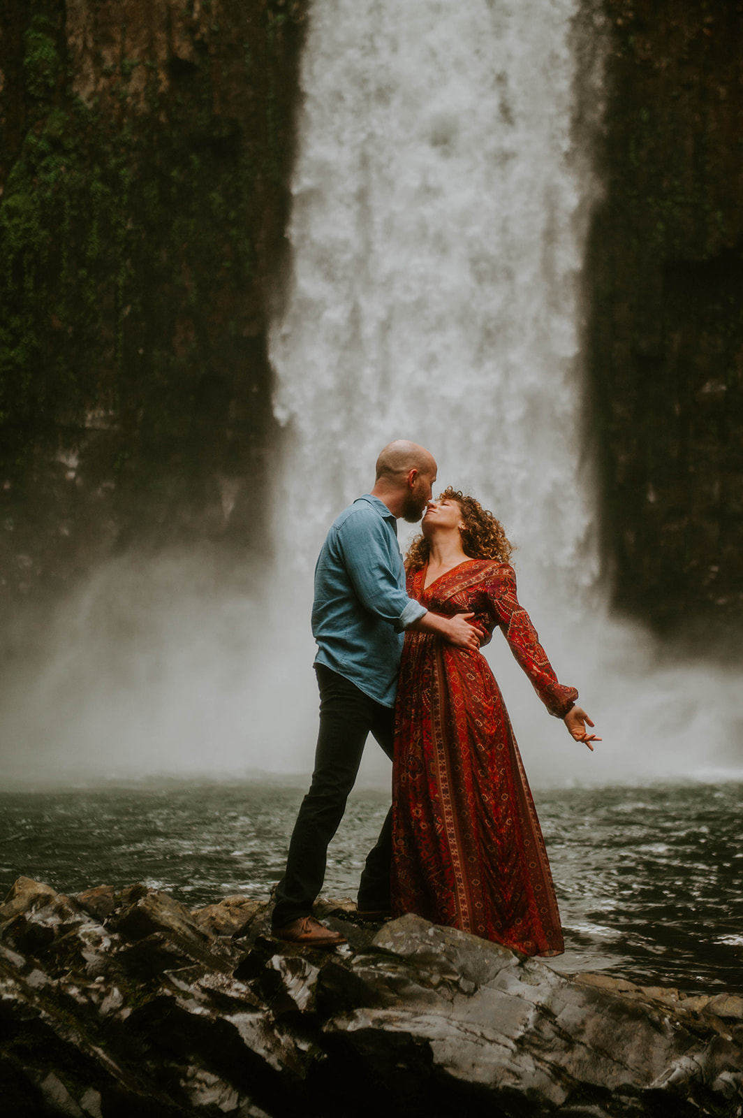 Couple in front of abiqua falls for their engagement photos