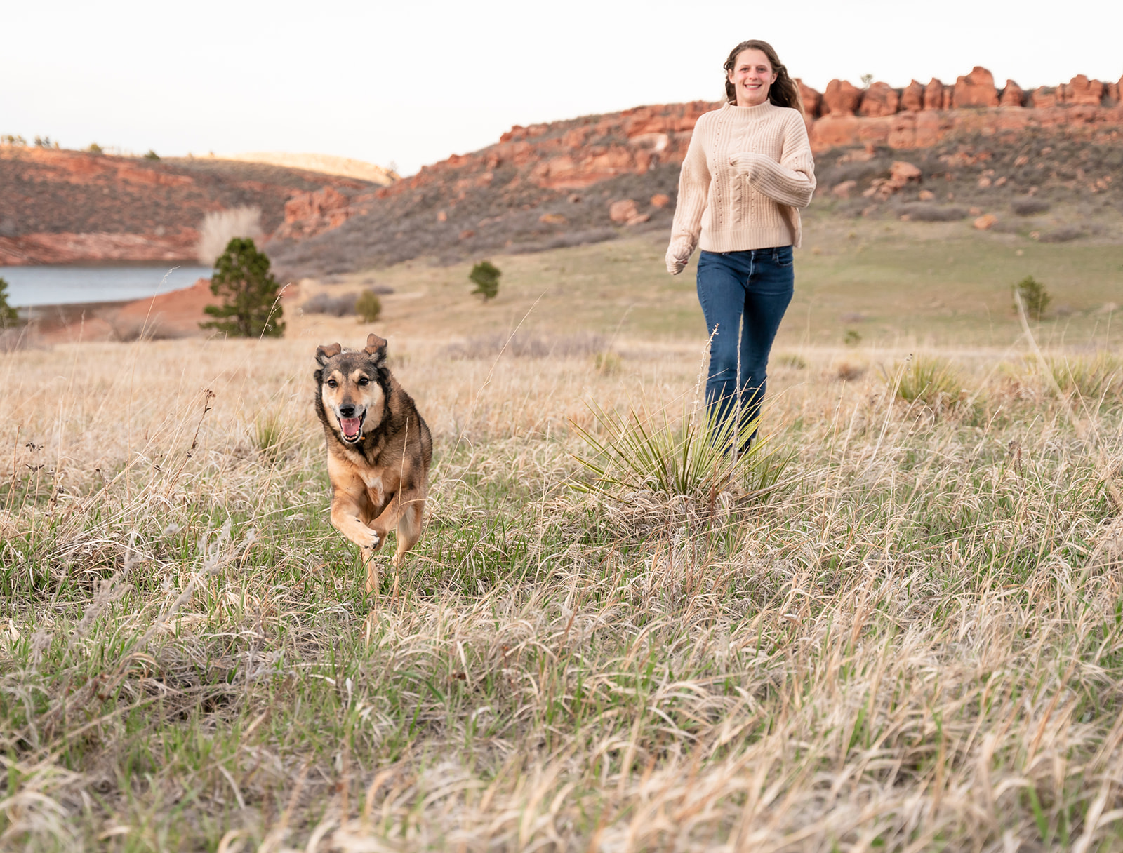 Girl and her dog enjoy hiking in Colorado