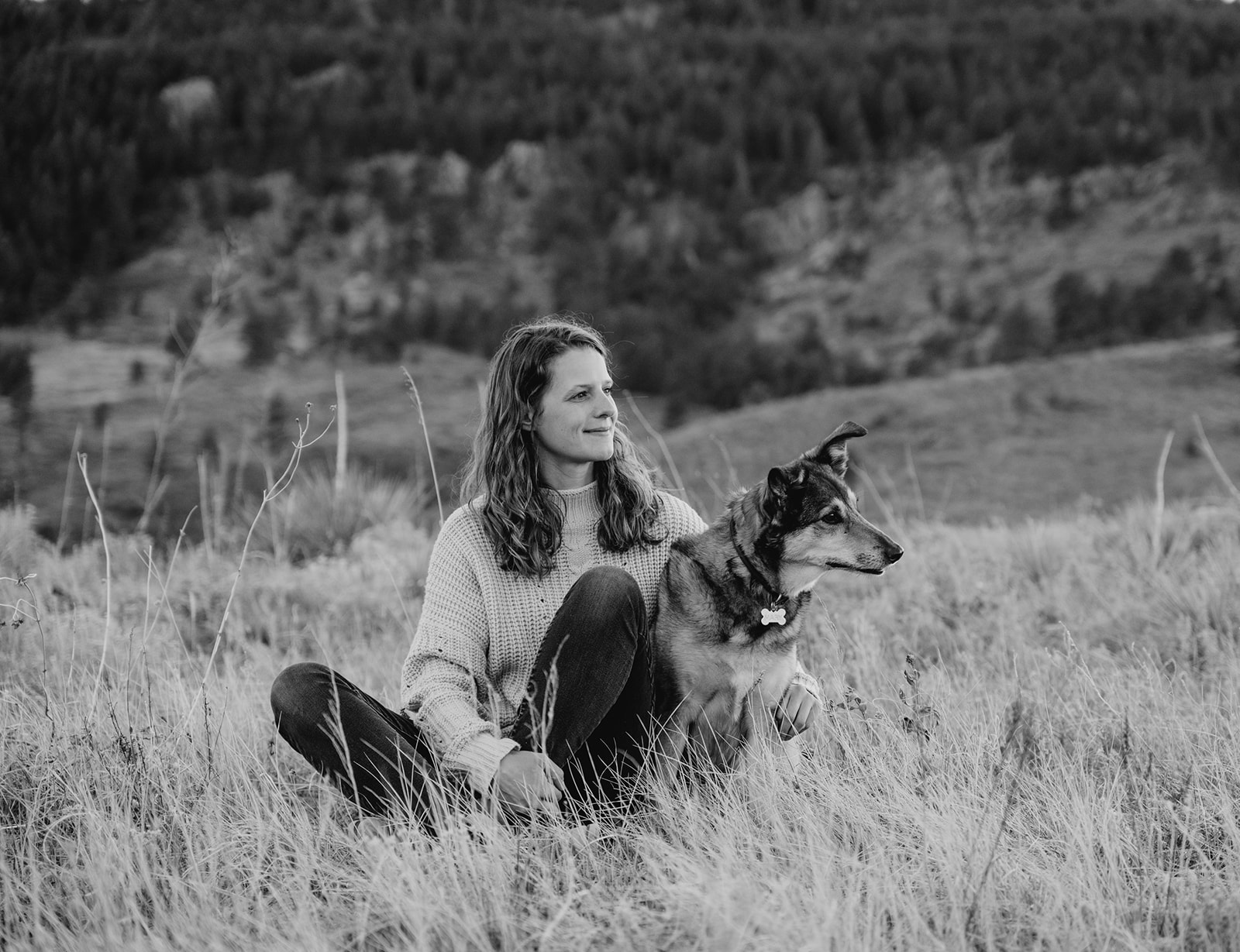 Black and white photo of woman with her dog in Colorado