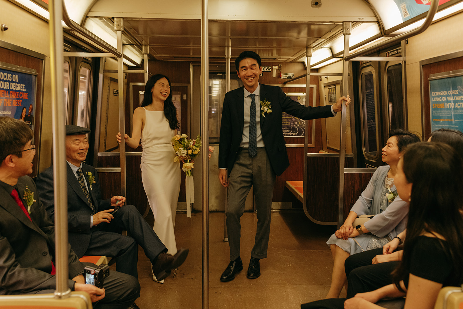 nyc couple with family on subway after elopement