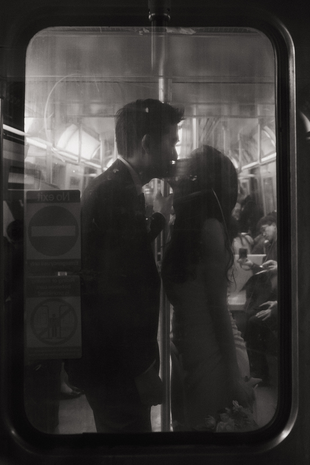 nyc couple kissing on subway