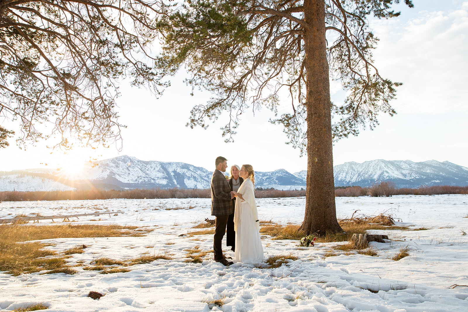 Eloping couple exchanging vows during intimate ceremony in South Lake Tahoe, CA