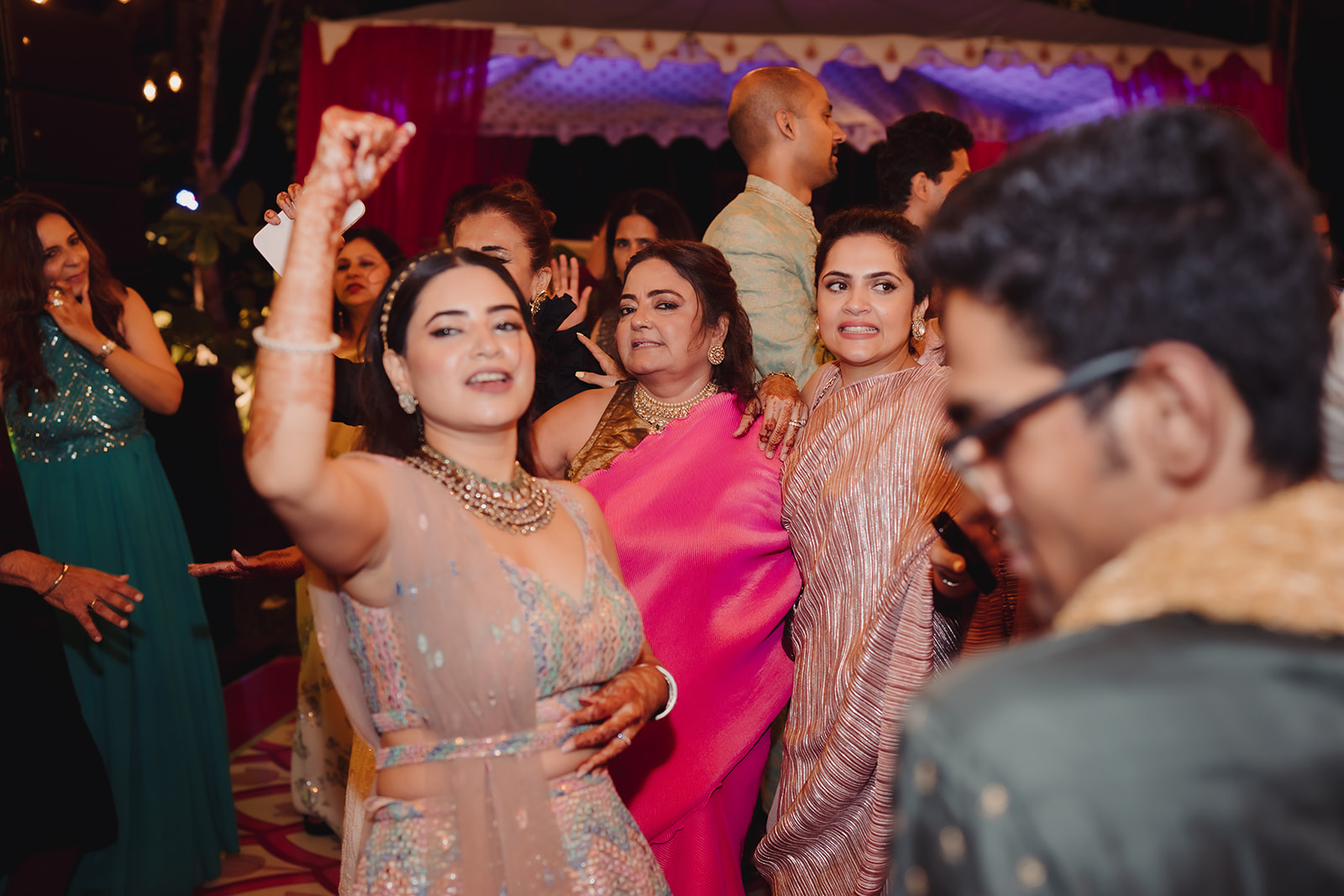 Night of fun: Capturing the enthusiasm as a guest dances away in the lively atmosphere