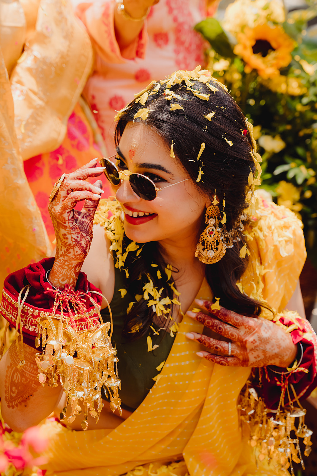 Golden moments: A stunning bride shines in the midst of her haldi ceremony