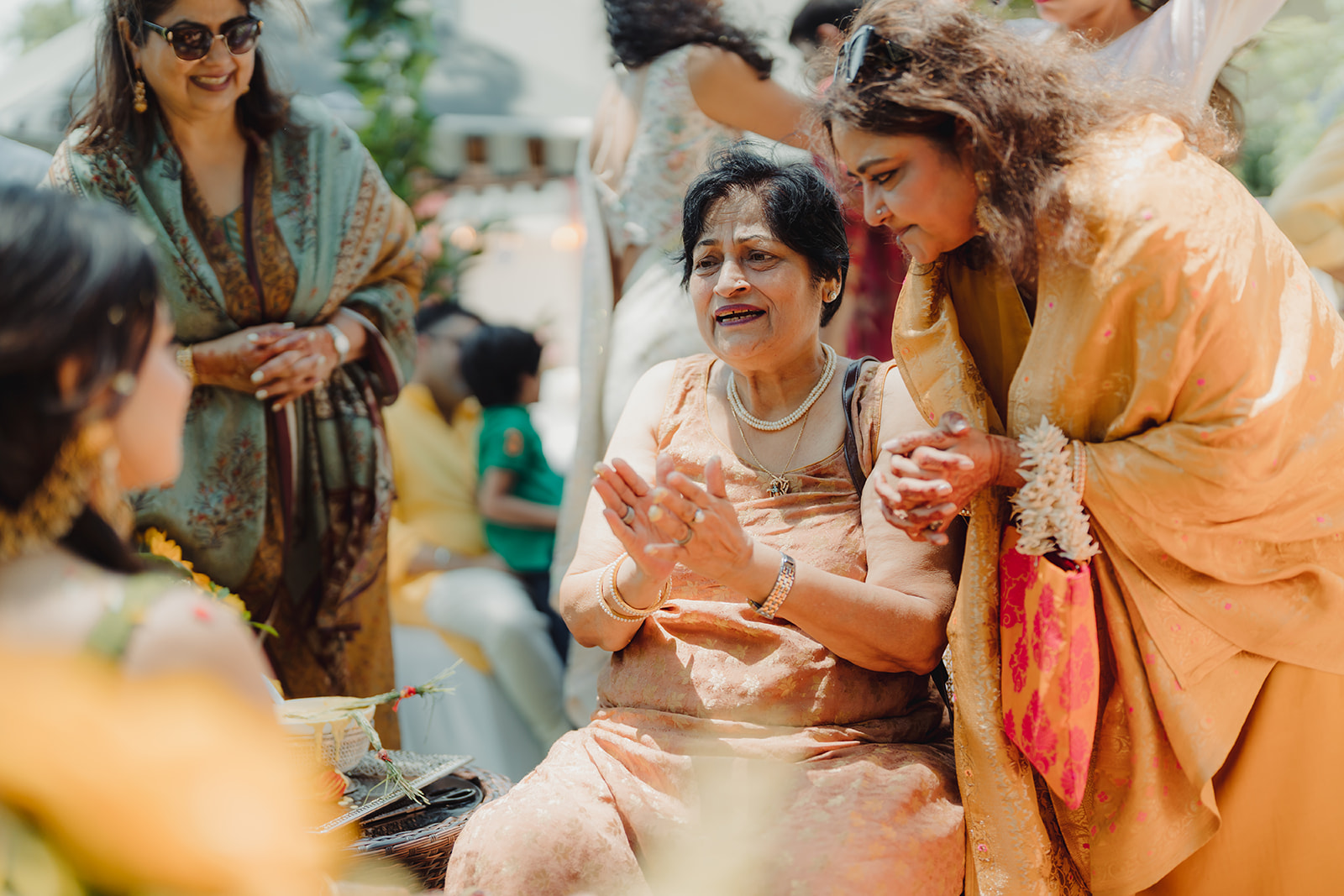Golden moments: Smiles and laughter fill the air during the haldi celebration