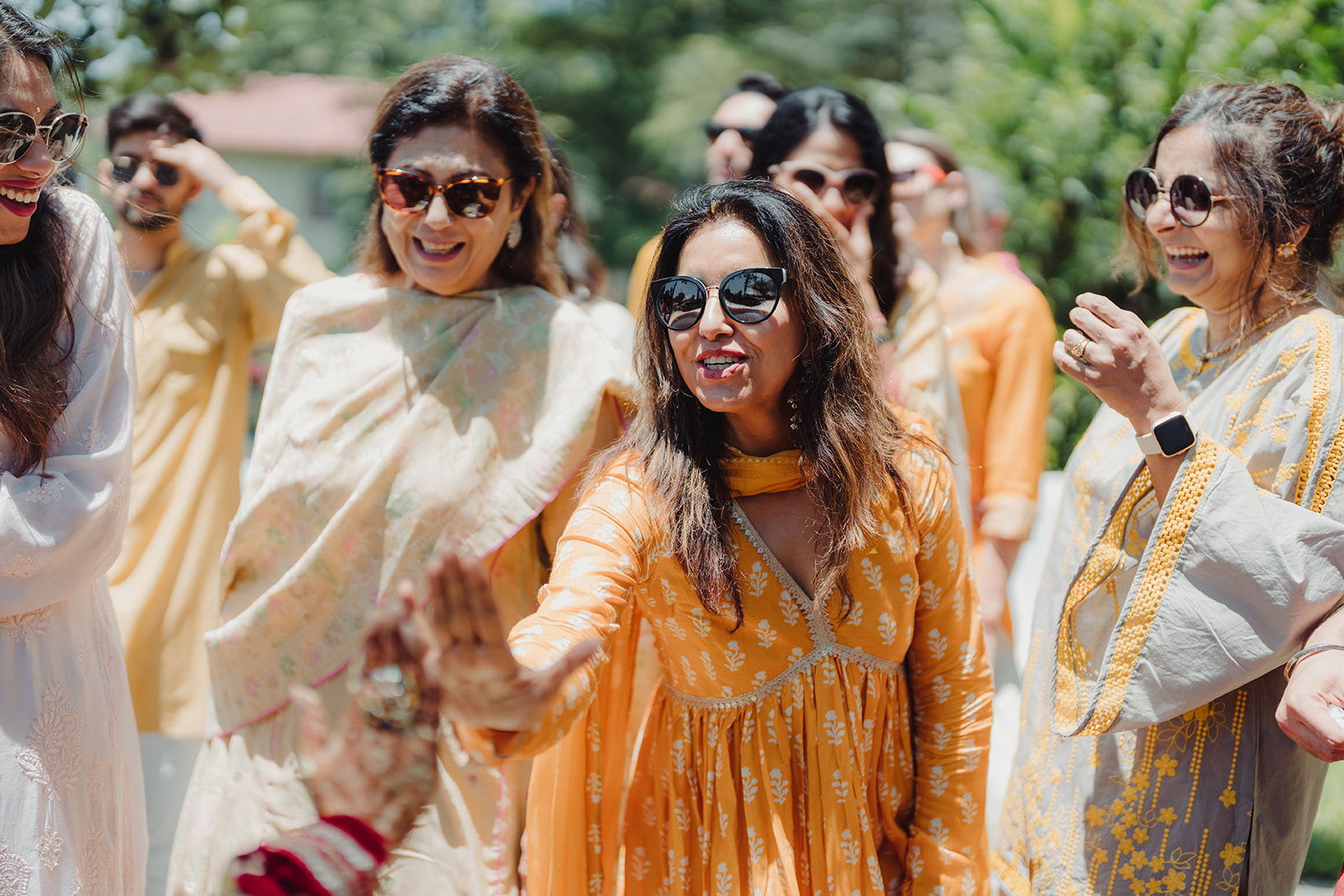 Celebrating in style: Participant relishing the vibrant and spirited haldi ritual.