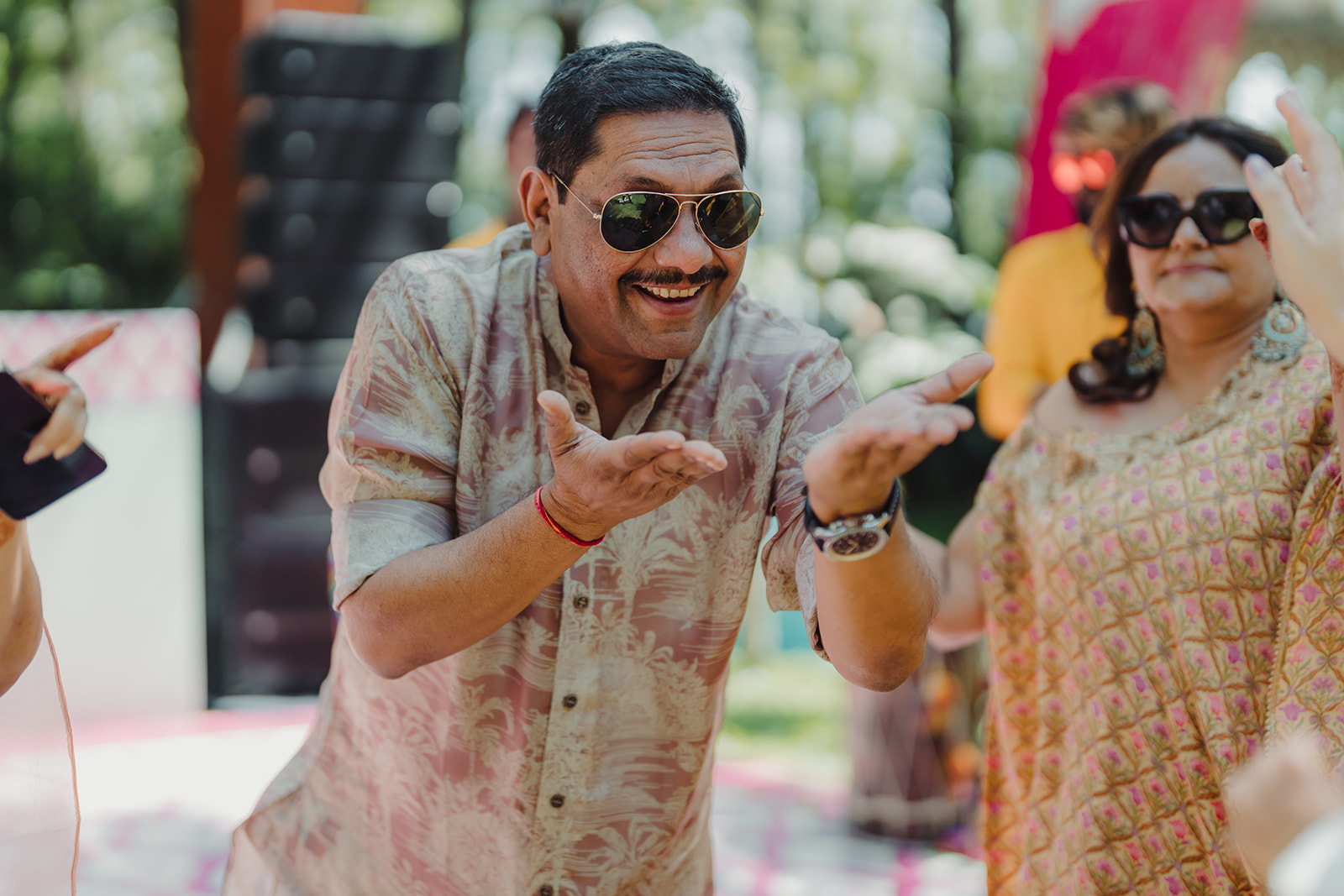 Celebration vibes: Guests savoring the moment with smiles and enthusiasm