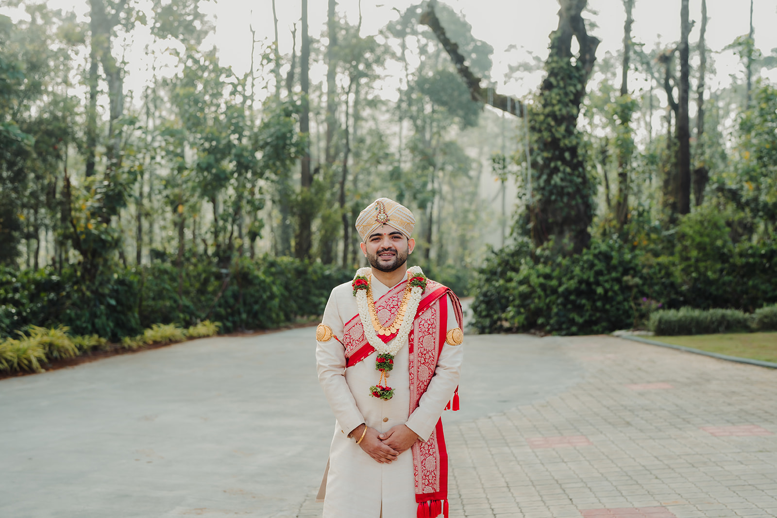 Majestic groom: The groom looks regal in his traditional wedding attire