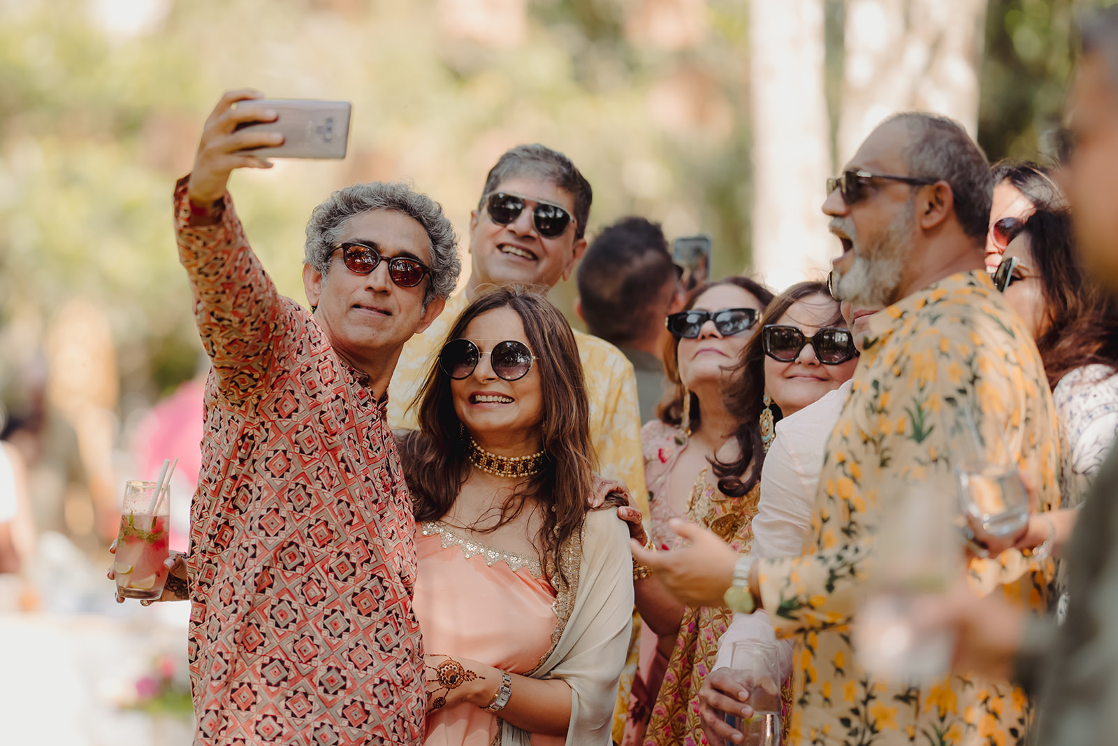 Selfie time: Guest snaps a picture, contributing to the lively event ambiance