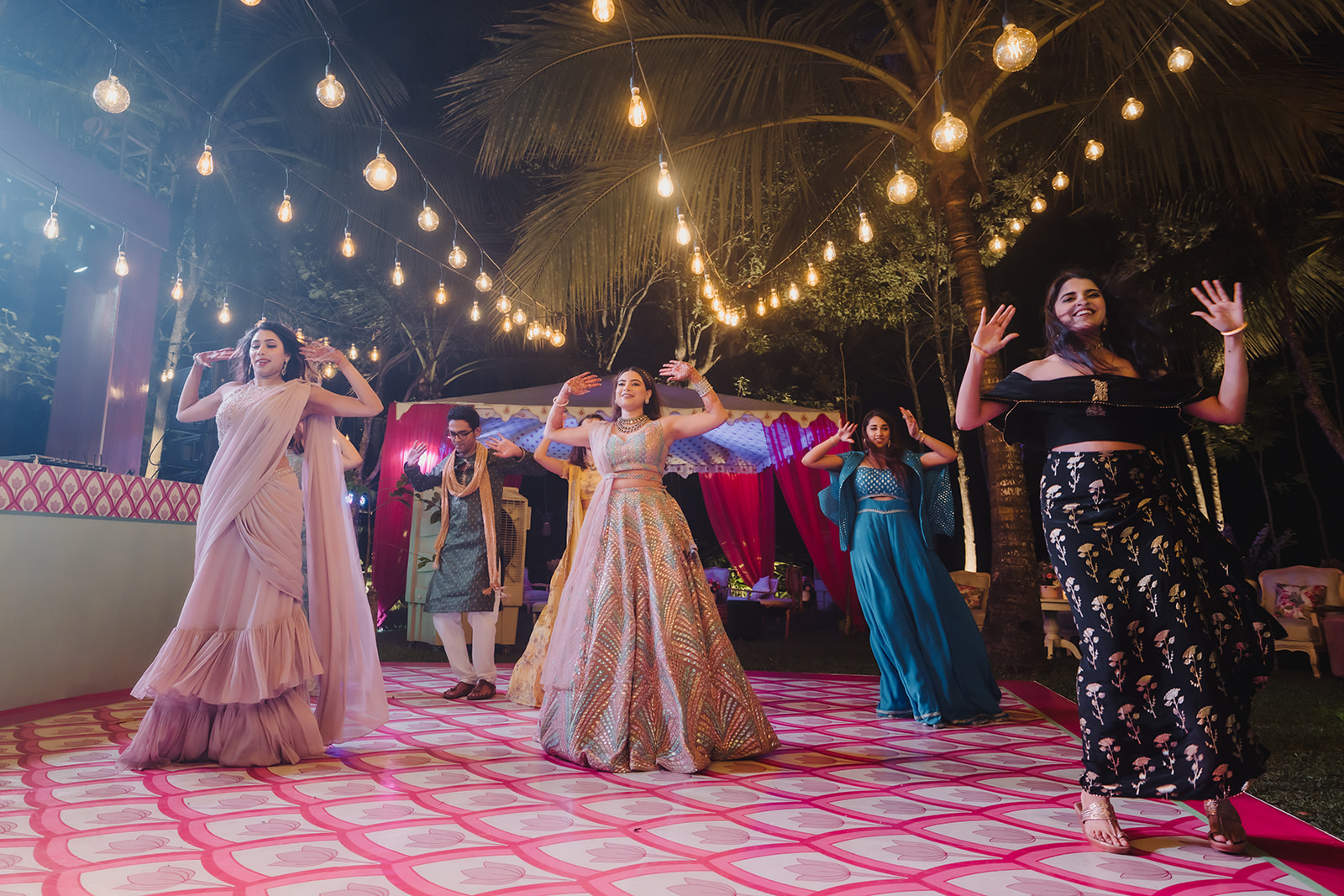 Family dance: Capturing the fun and energy as the bride enjoys a dance with her cousins