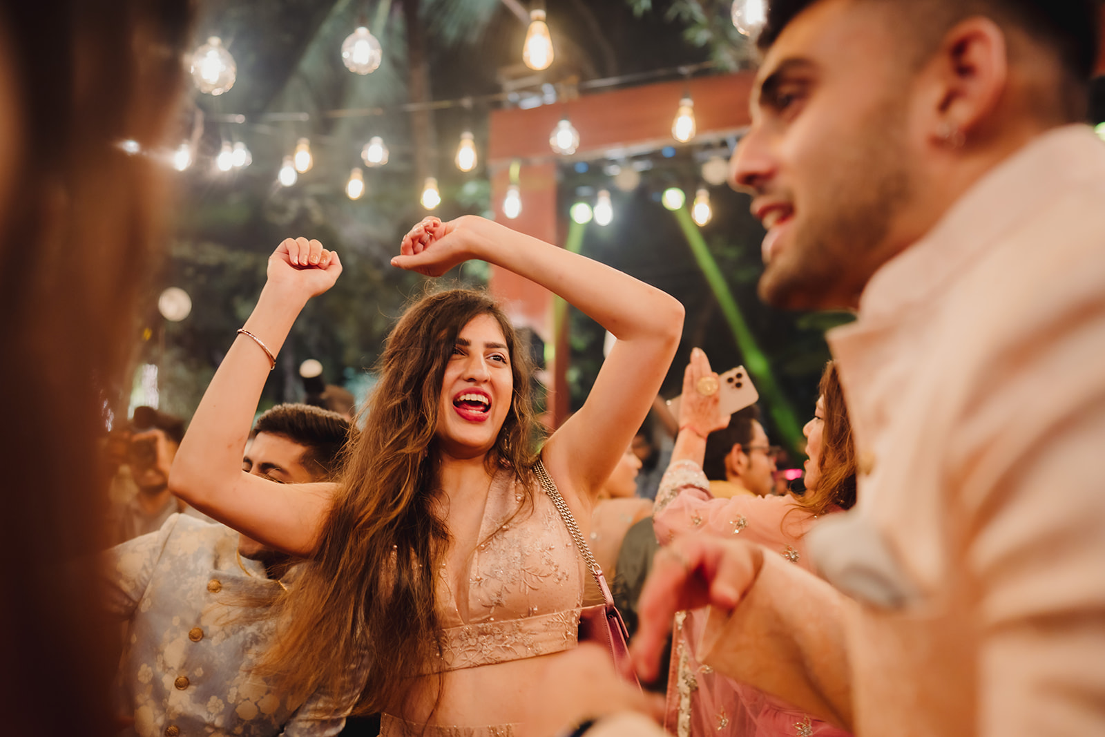 Dance floor revelry: Guest joyfully dancing the night away at the event