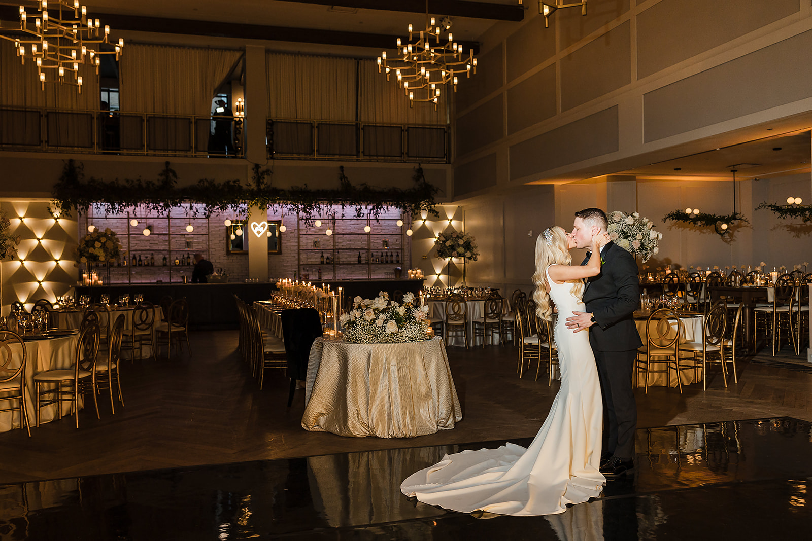 Bride and groom in the empty reception space at the Lucy by Cescaphe wedding venue in Philadelphia