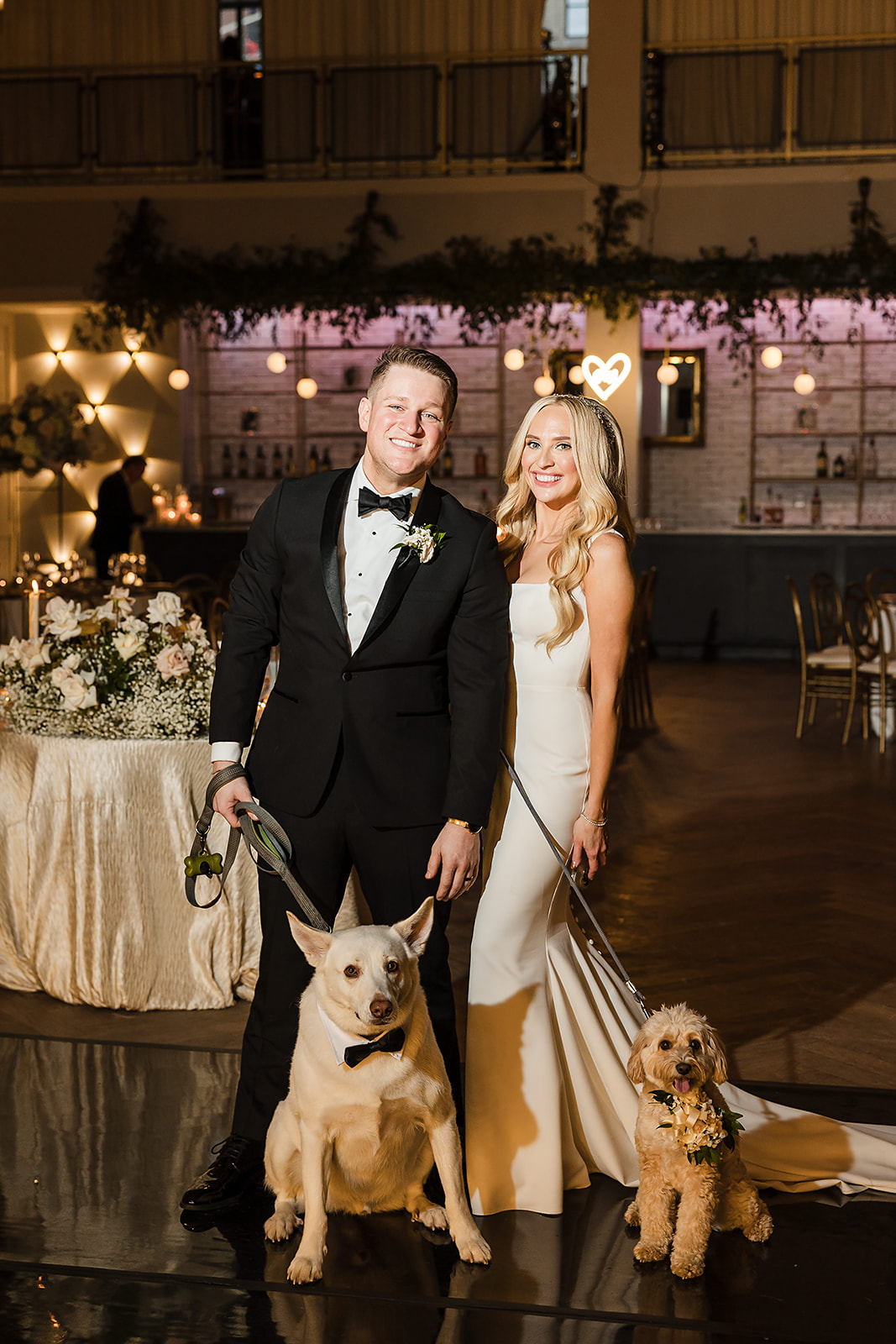 Bride and groom wedding photo with their puppies at the Lucy by Cescaphe wedding in Philadelphia