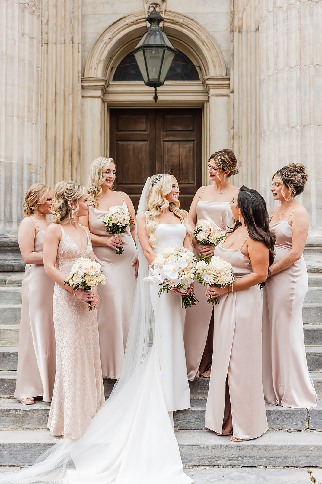 Stunning bridesmaids in blush pink jenny yoo dresses at First National Bank in the Old City Philadelphia