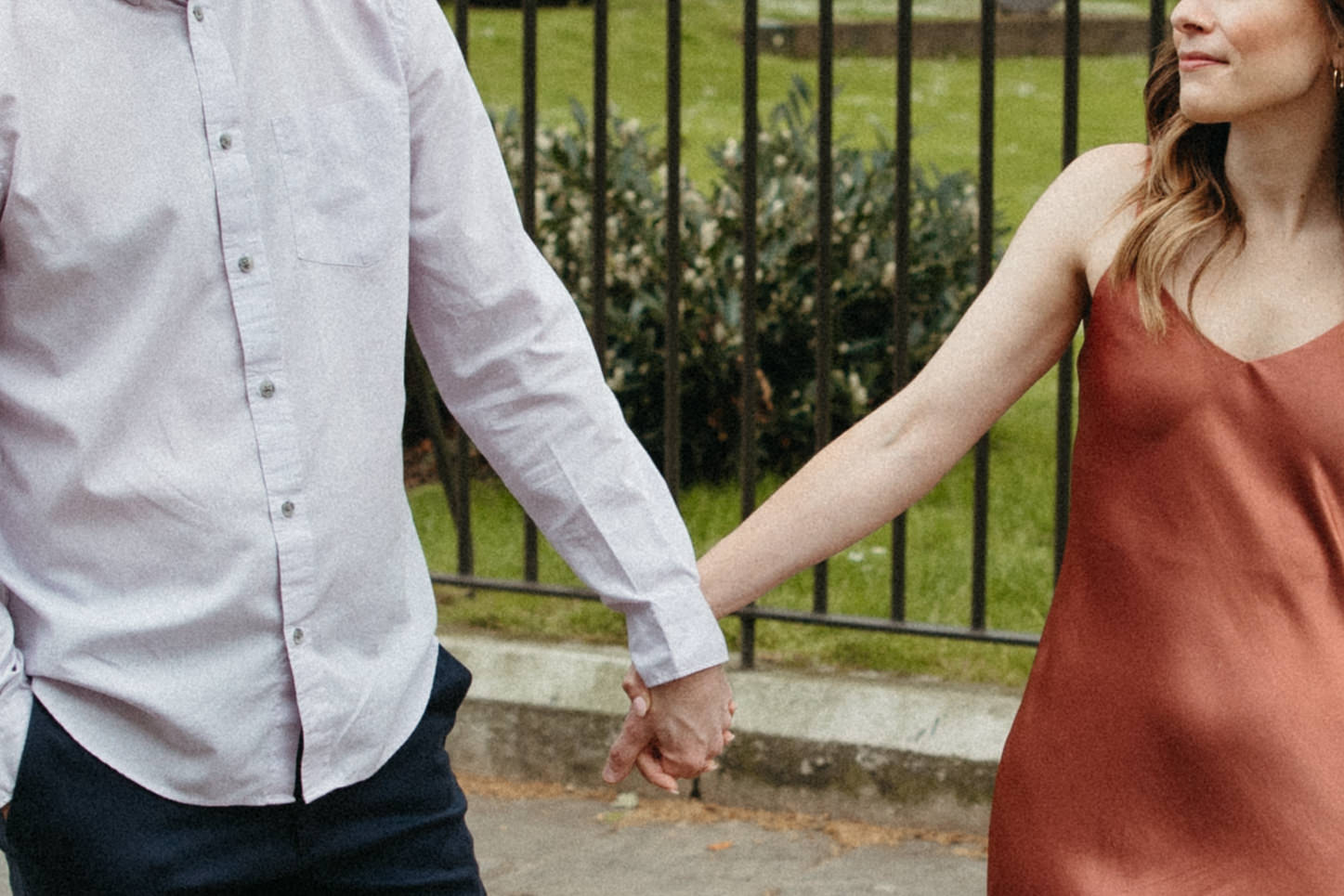 A couple is seen holding hands near Regent’s Park in London for their old money aesthetic engagement session. 