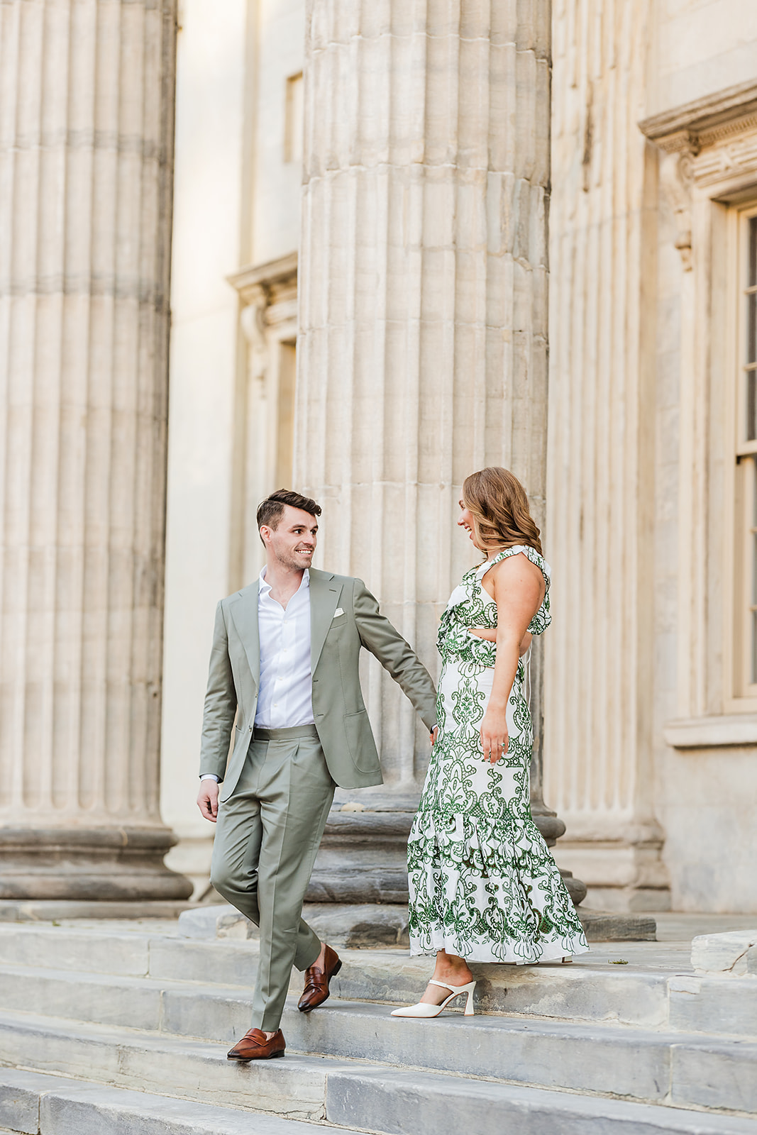 Candid engagement session photos in Old City Philadelphia at First National Bank