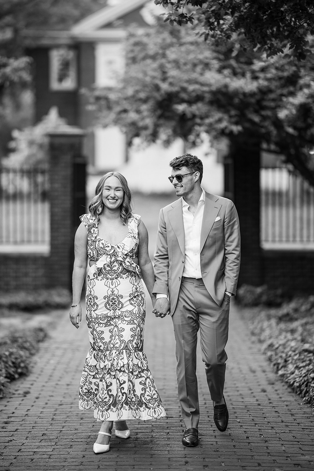 Stylish black and white engagement session photos in Philadelphia Old City near 18th-century gardens