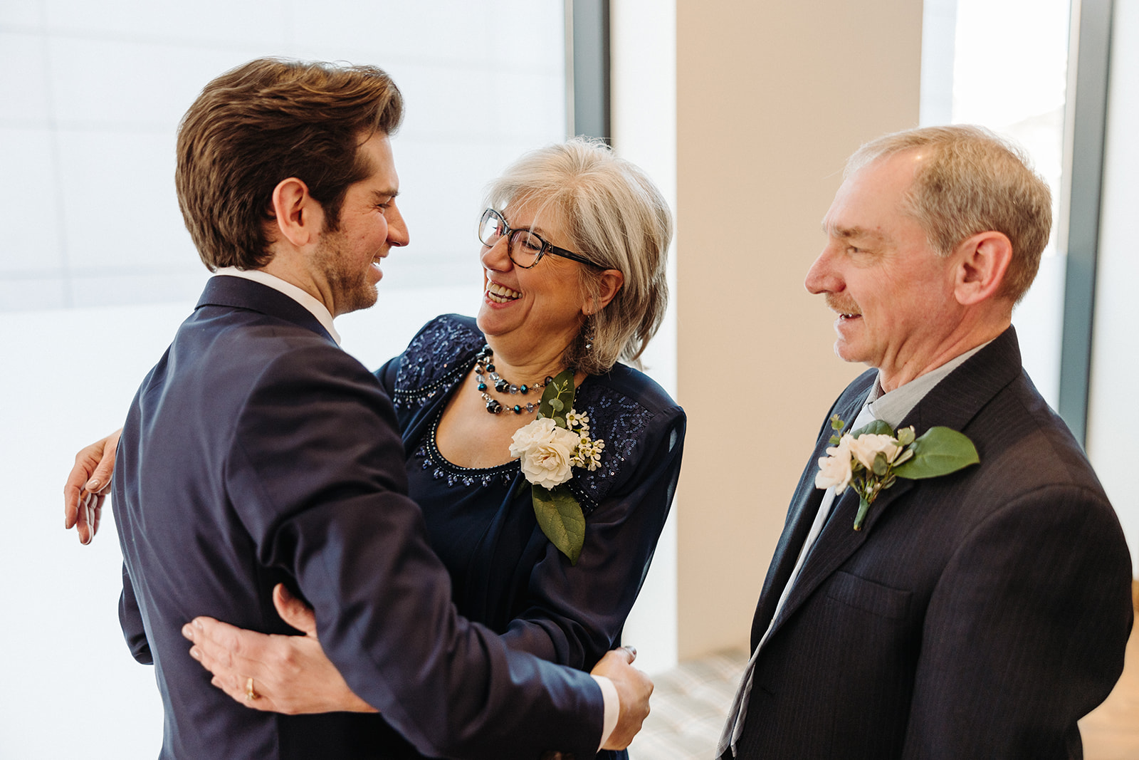 First look with the groom and his parents