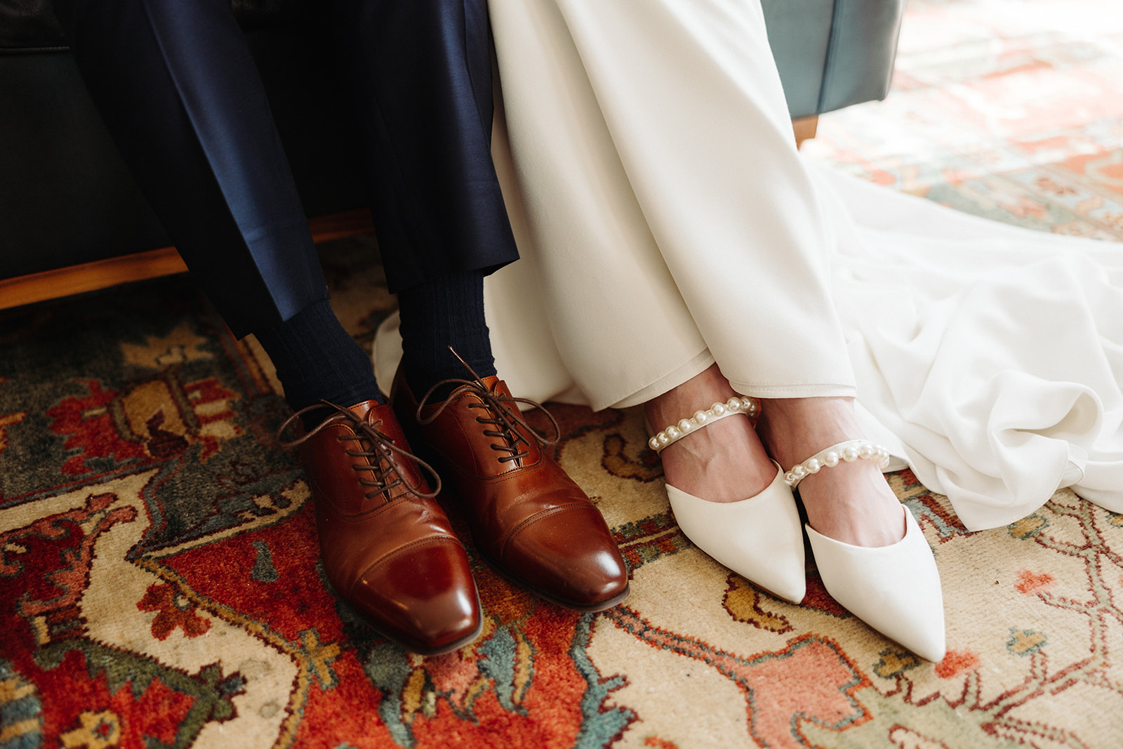 close up to the Bride and groom's shoes