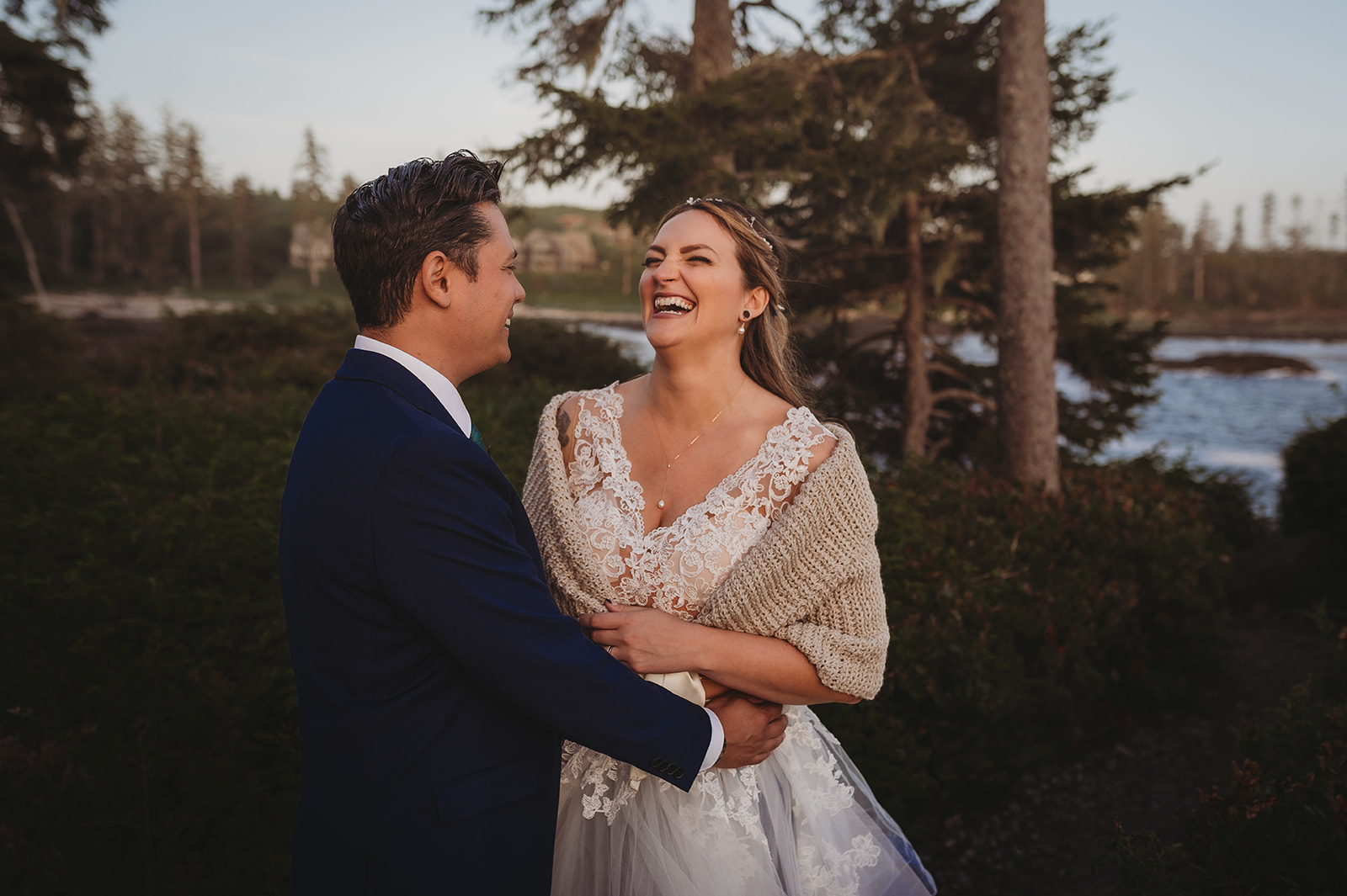 Couple enjoying golden hour during their reception at Black Rock Resort in Ucluelet, BC