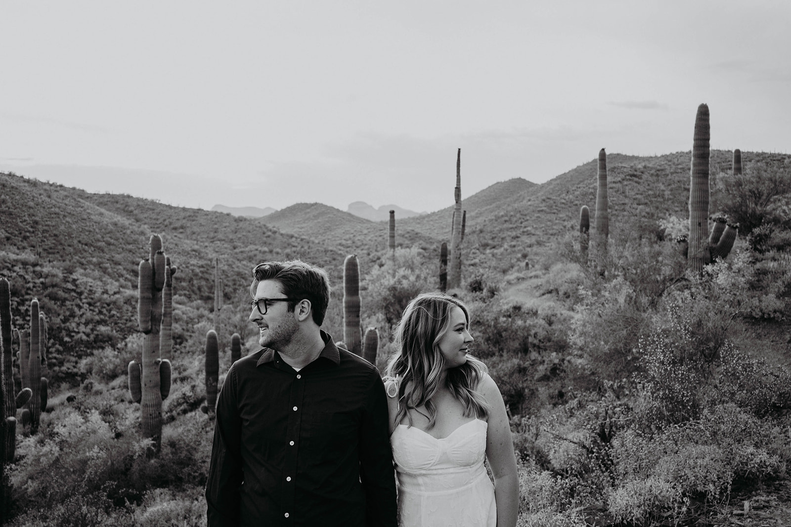 desert couple at river park for documentary engagement Arizona session, moody and romantic arizona sunset 