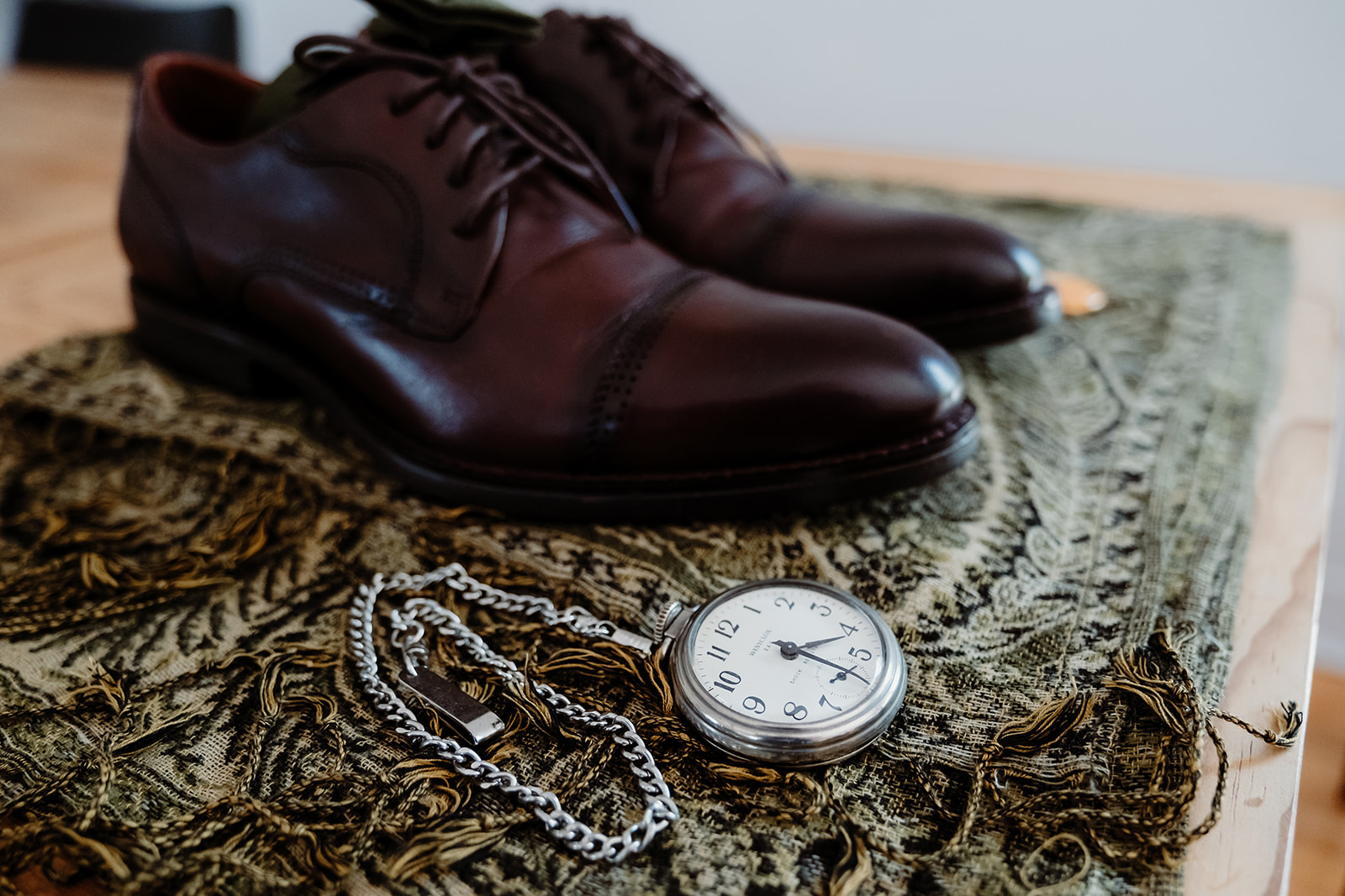 Groom shoes and vintage watch details
