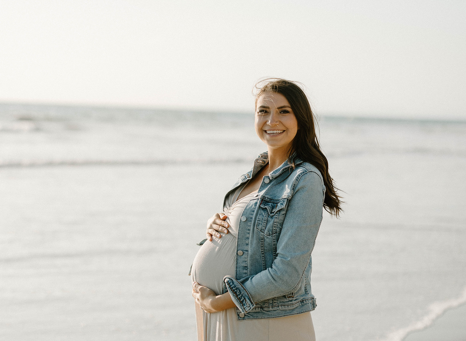 Maternity photos at the beach for a couple in San Diego California