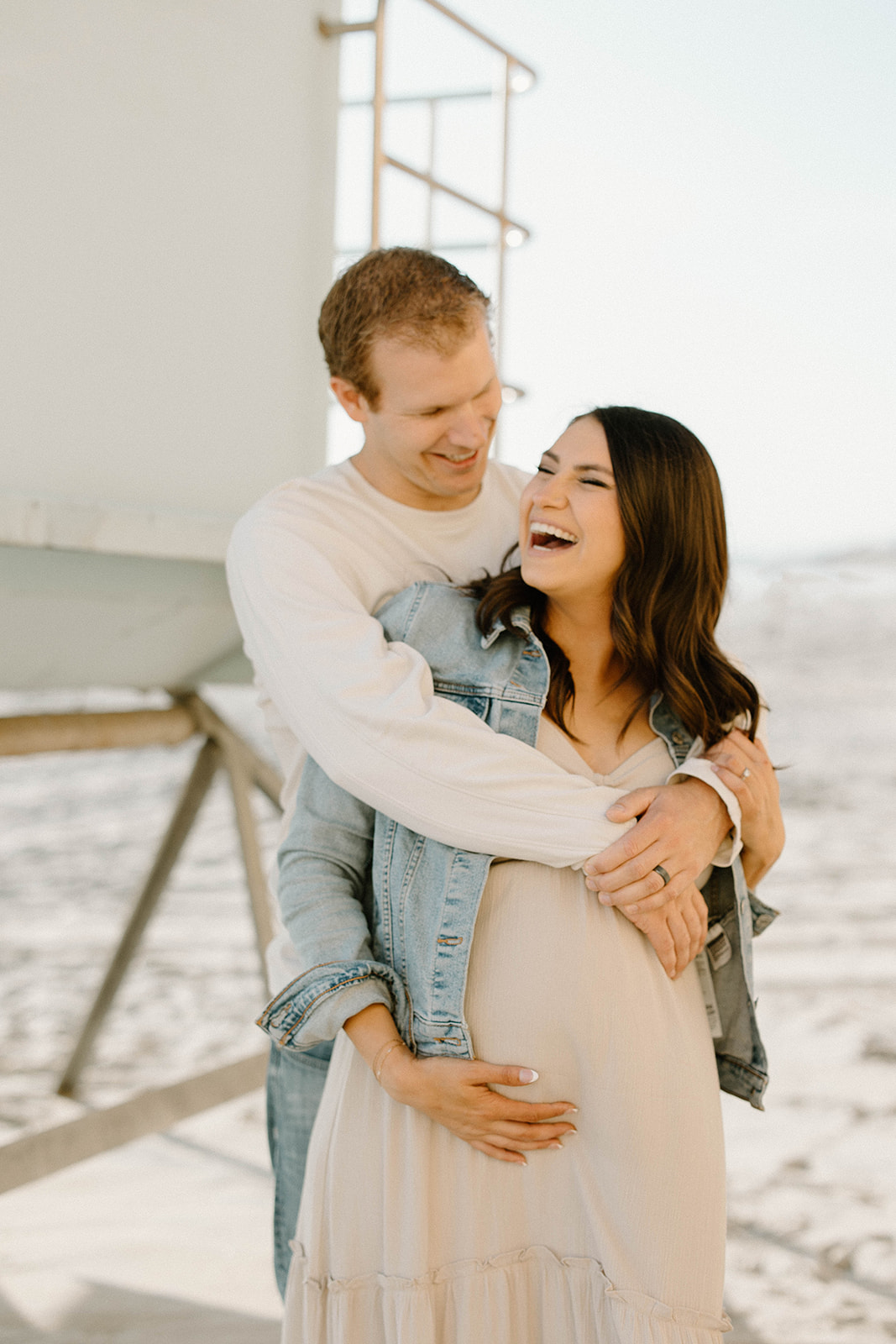 Maternity photos at the beach for a couple in San Diego California