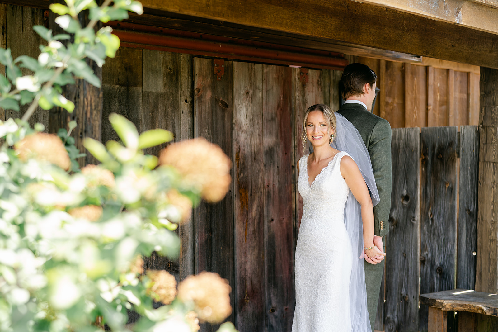 first look with the bride and groom at frutig farm