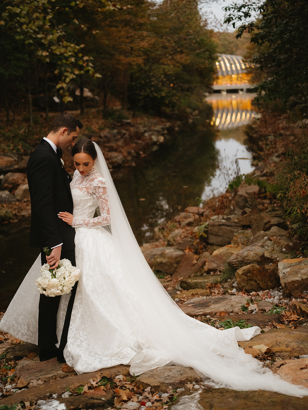 bride and groom evening wedding at crystal bridges