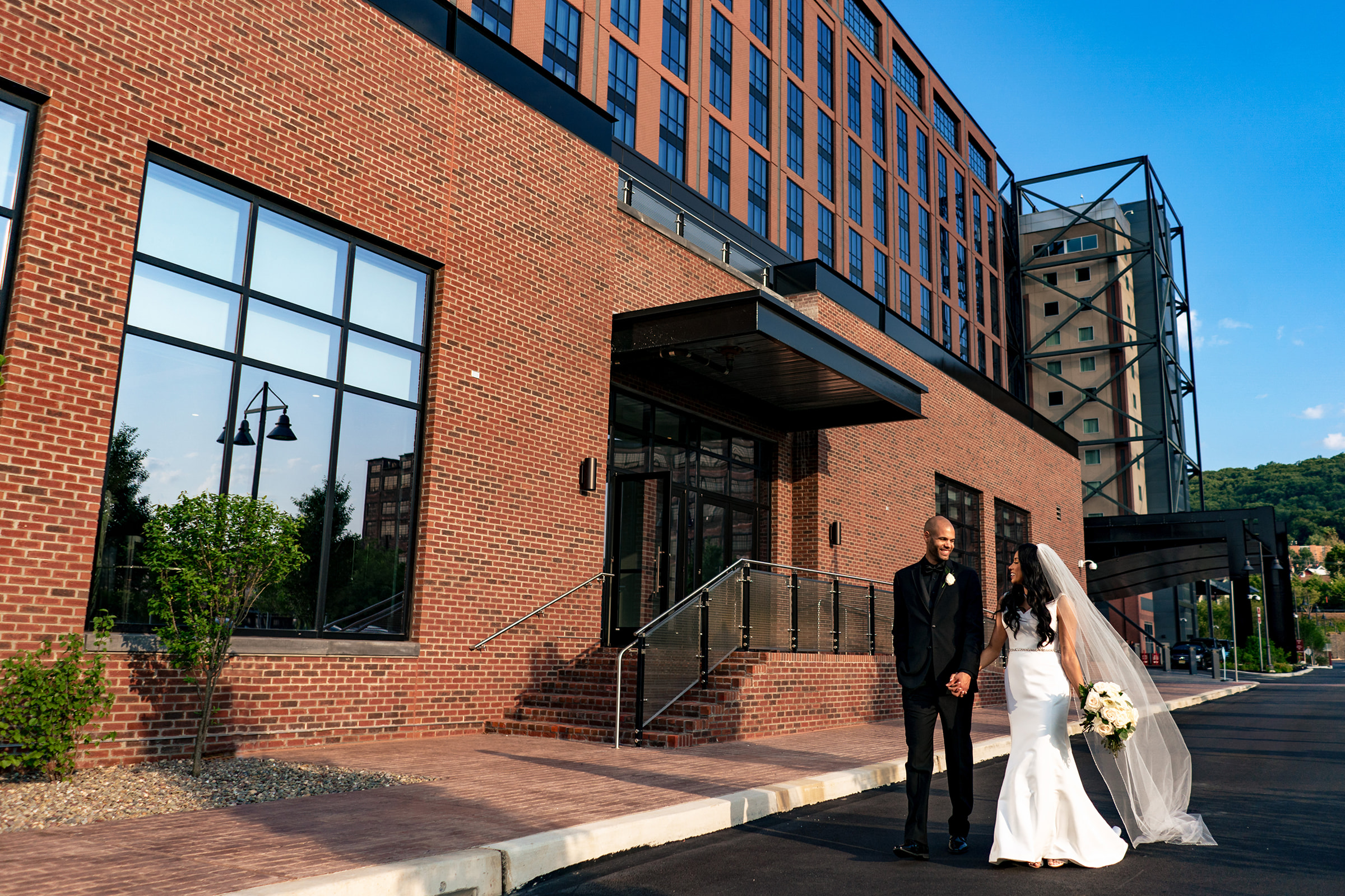 Portraits of a bride and groom with their bridal party at Wind Creek Event Center