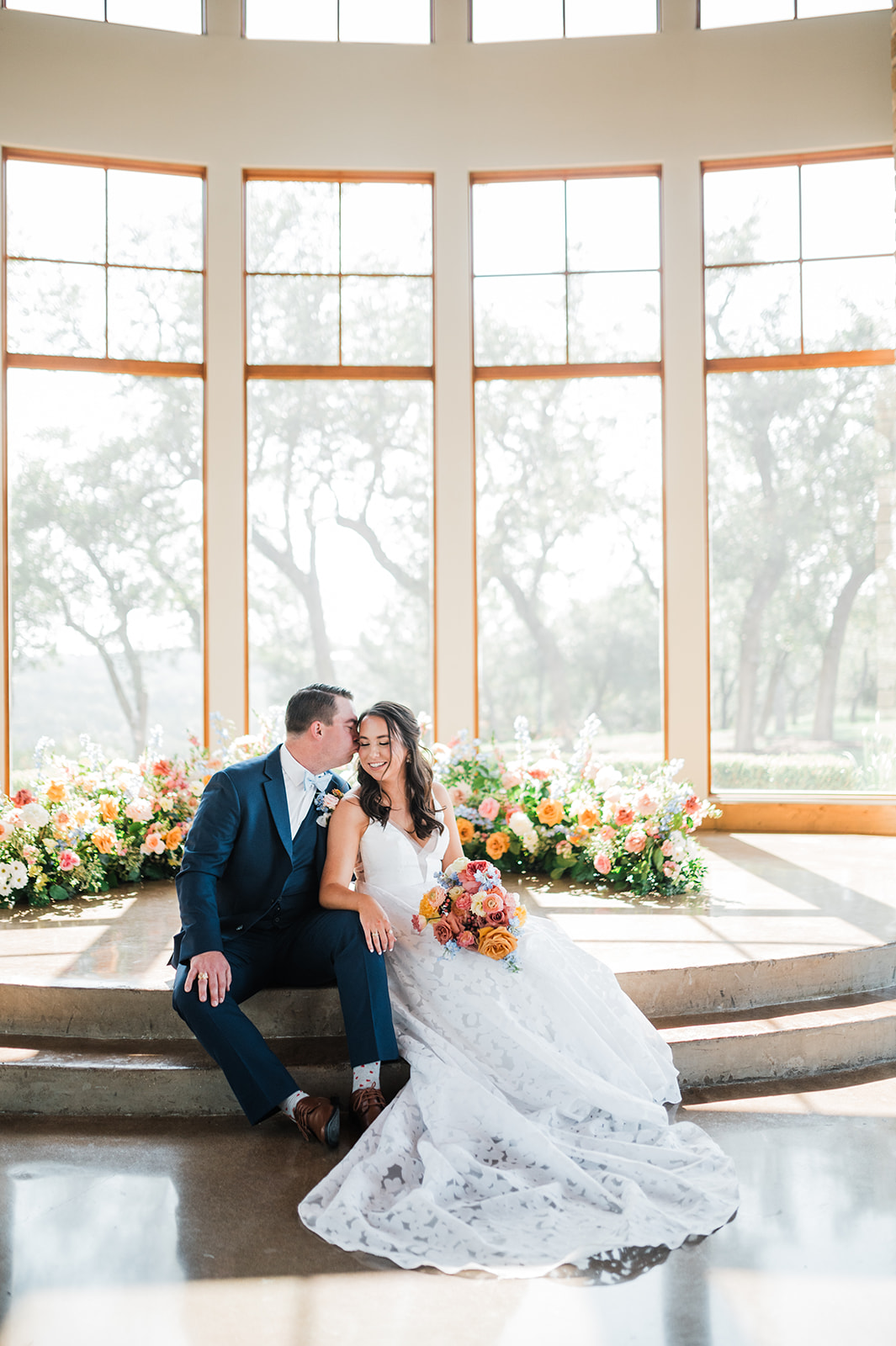 Colorful summer wedding at Canyonwood Ridge in Dripping Springs, TX. 