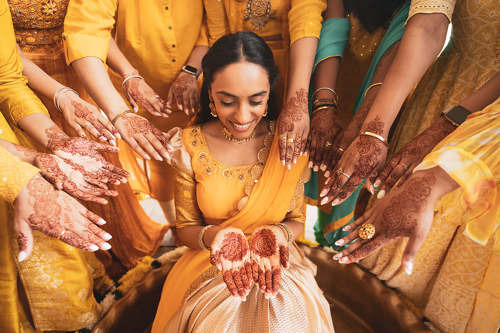Bridal Mehndi in yellow dress pose ideas