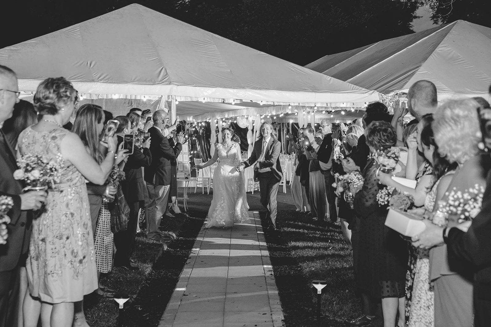 The send off -- guests lined the sidewalk from the tent to wish the couple well.