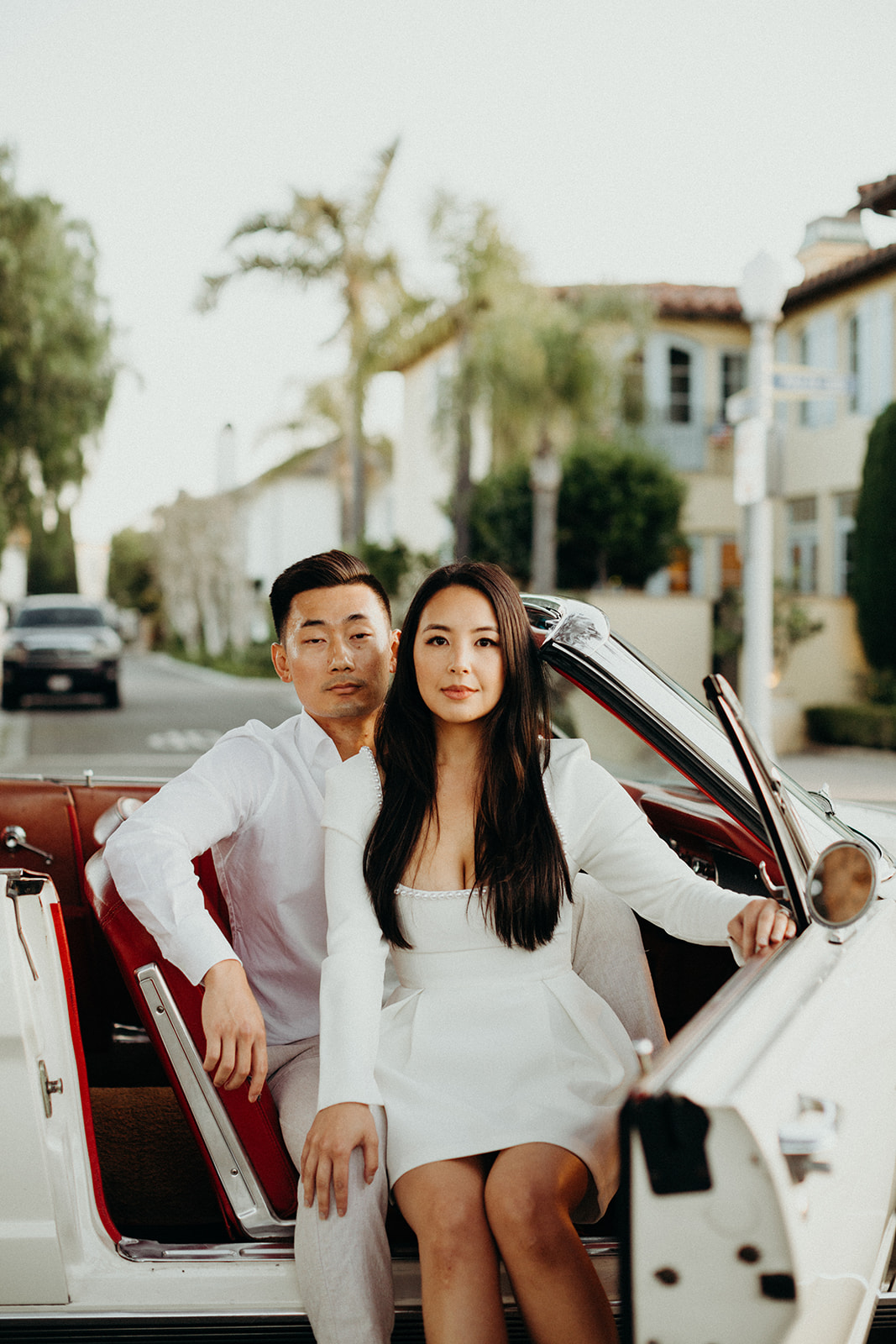 editorial style engagement session with a vintage car
