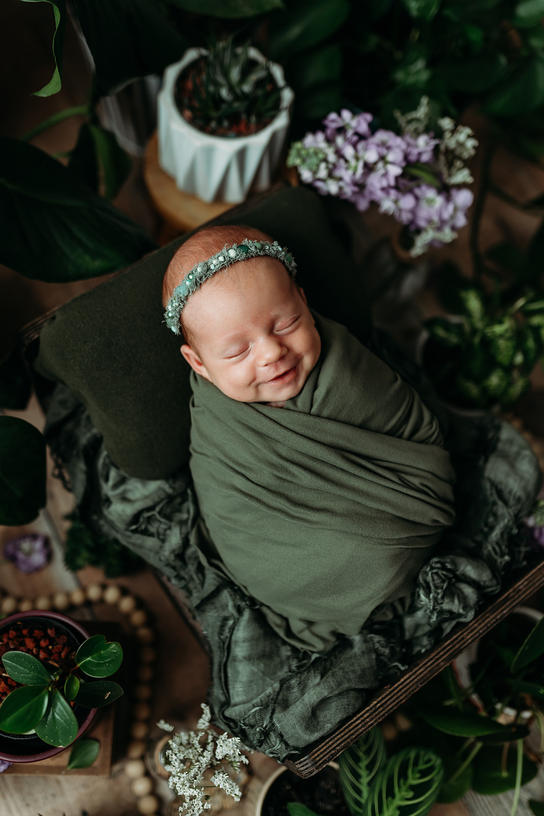 Newborn baby girl photos with plants inspiration 