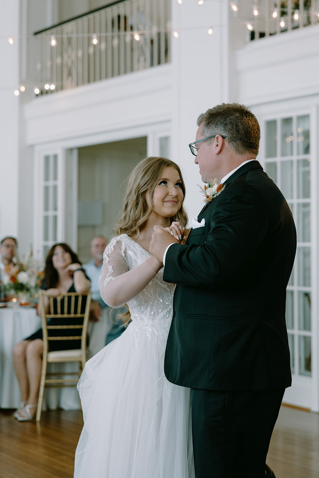 Summer wedding at Hotel Concord, captured by Charlotte Wedding Photographers and Videographers in North Carolina