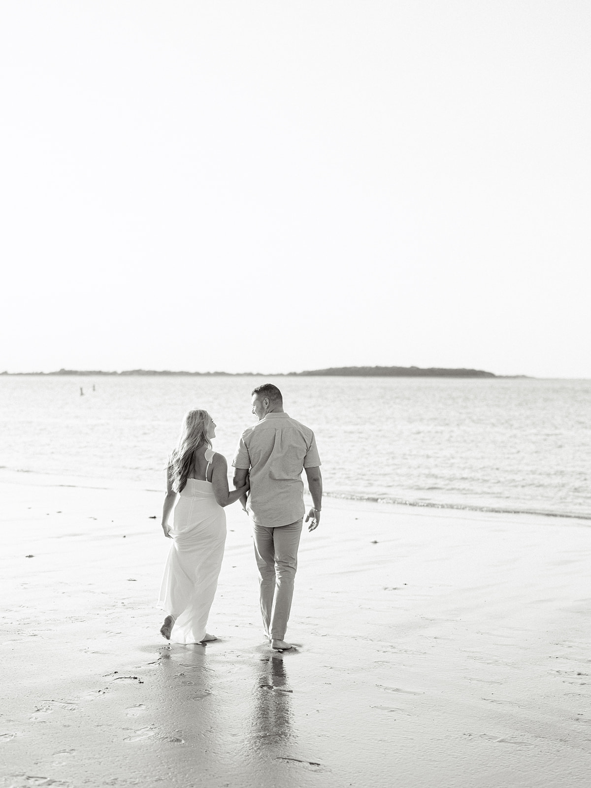 Bride and groom at Crane Beach in Massachusetts' North Shore.