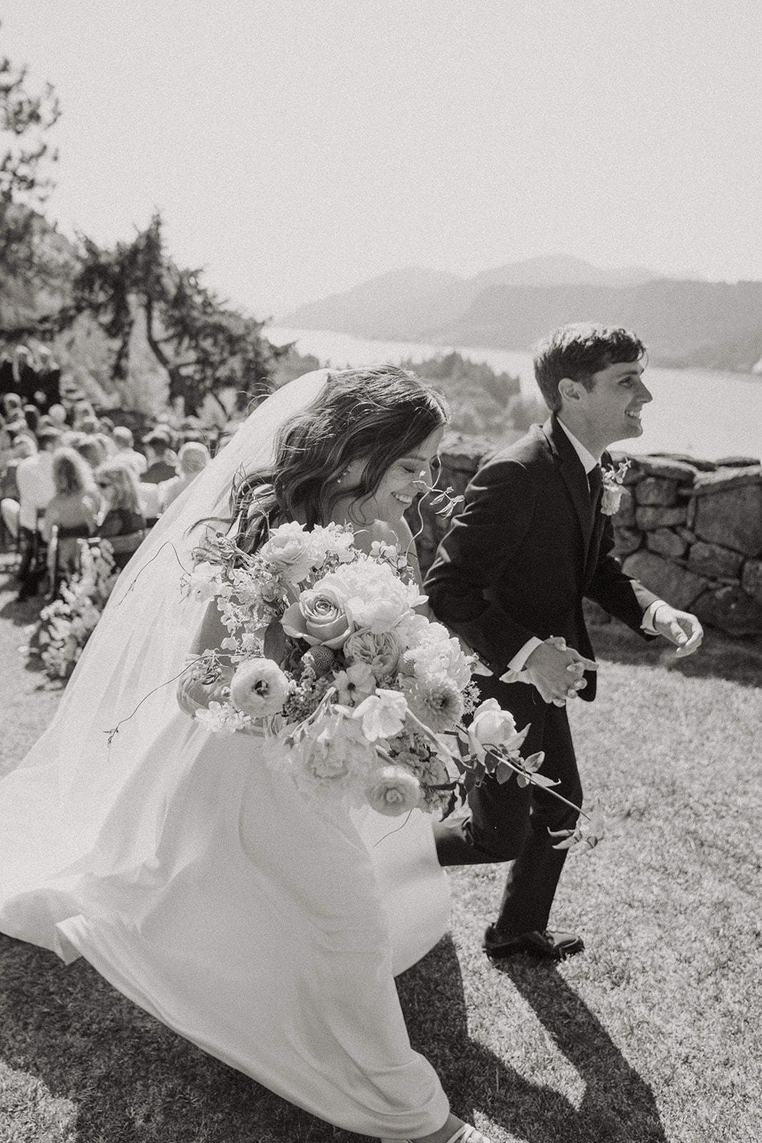 Bride and groom exit their wedding ceremony at the Griffin House on the Columbia River Gorge