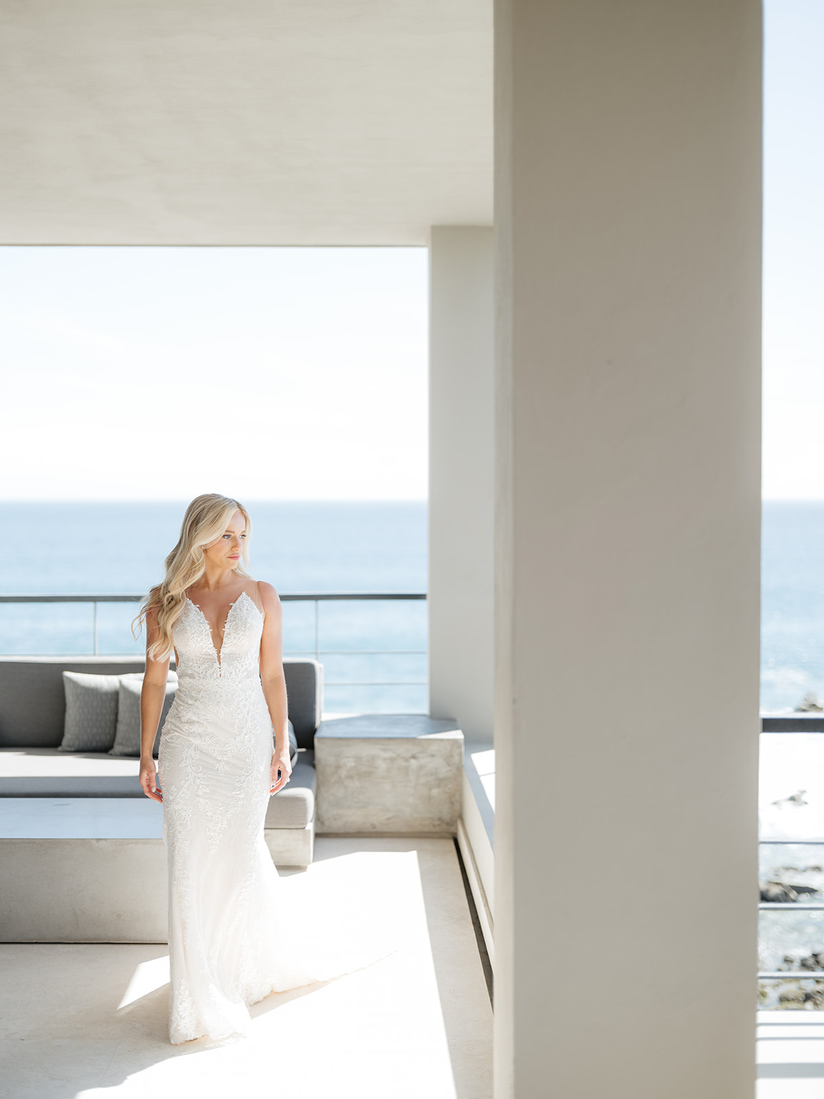 bride in a villa looking over the mexico beach at the cape in cabo