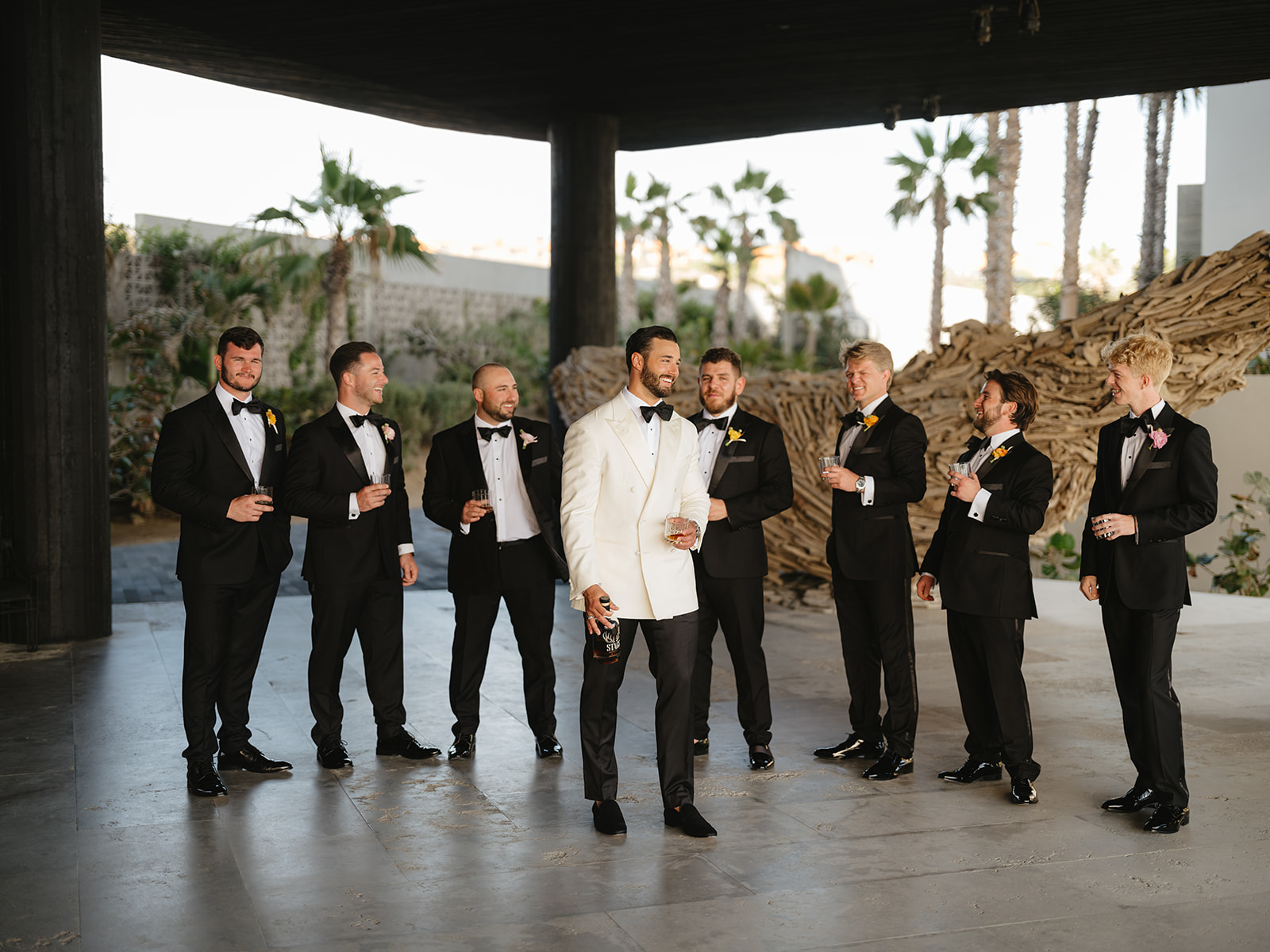 groomsmen photos at the cape hotel in cabo mexico