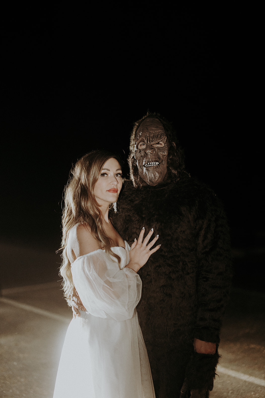 A wedding elopement couple where the groom is dressed up in a bigfoot costume.