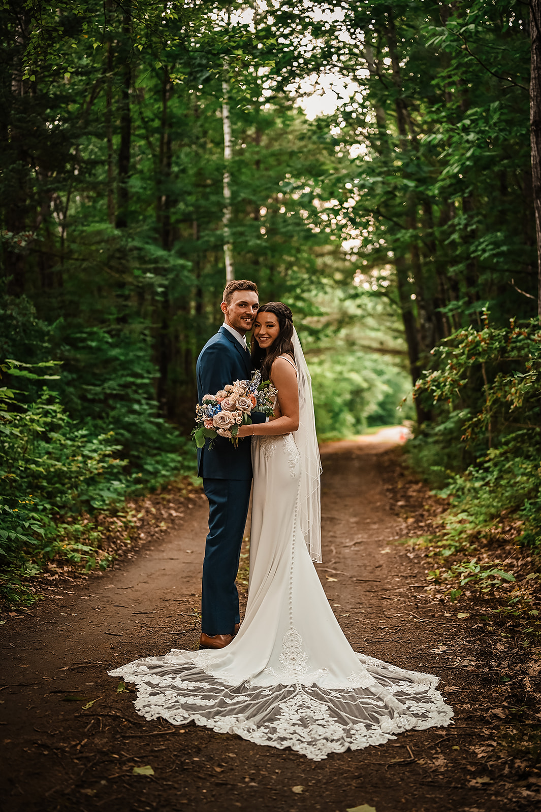 Chandler and Tyler were married at The Water's Edge Estate in Skowhegan, Maine. The setting for the wedding was absolute