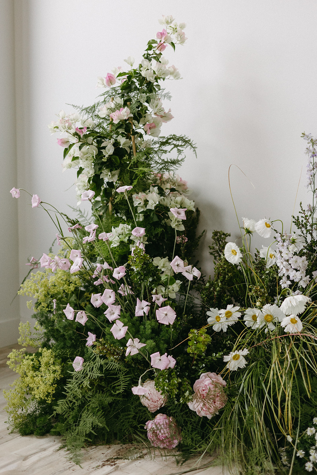 A large wildflower wedding arrangement for a garden party wedding. 