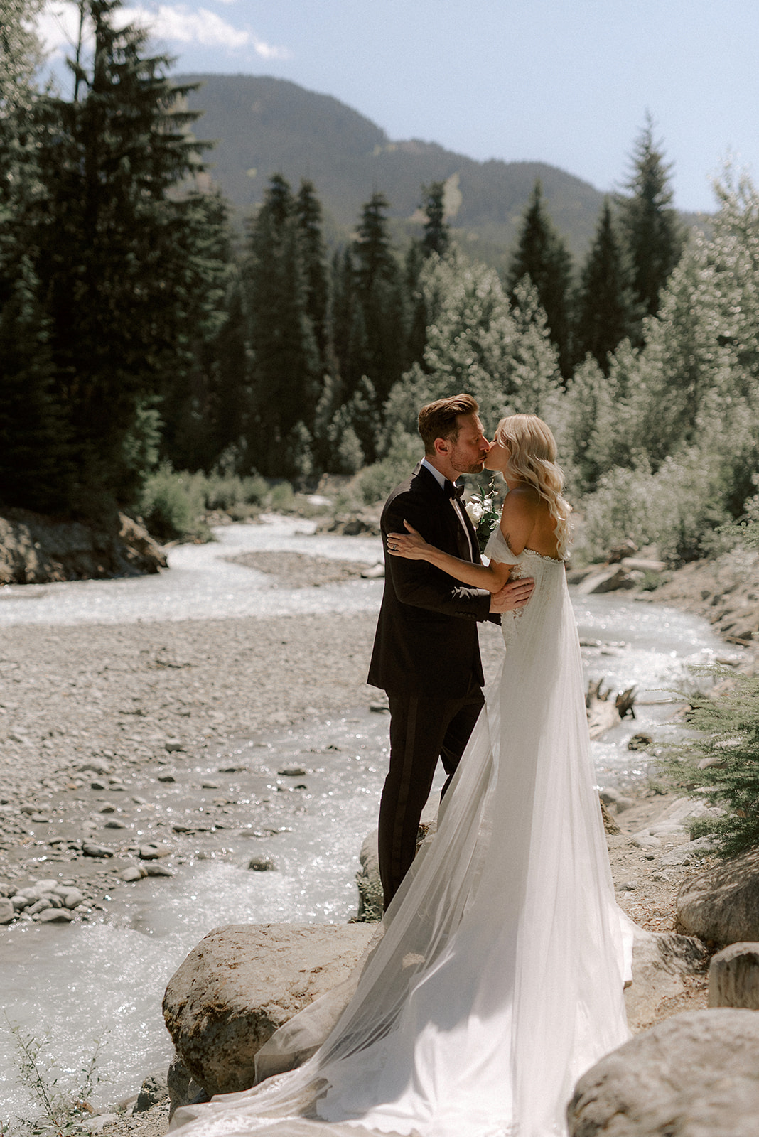 Vancouver wedding photographer captures photos of couple having their first look in Whistler