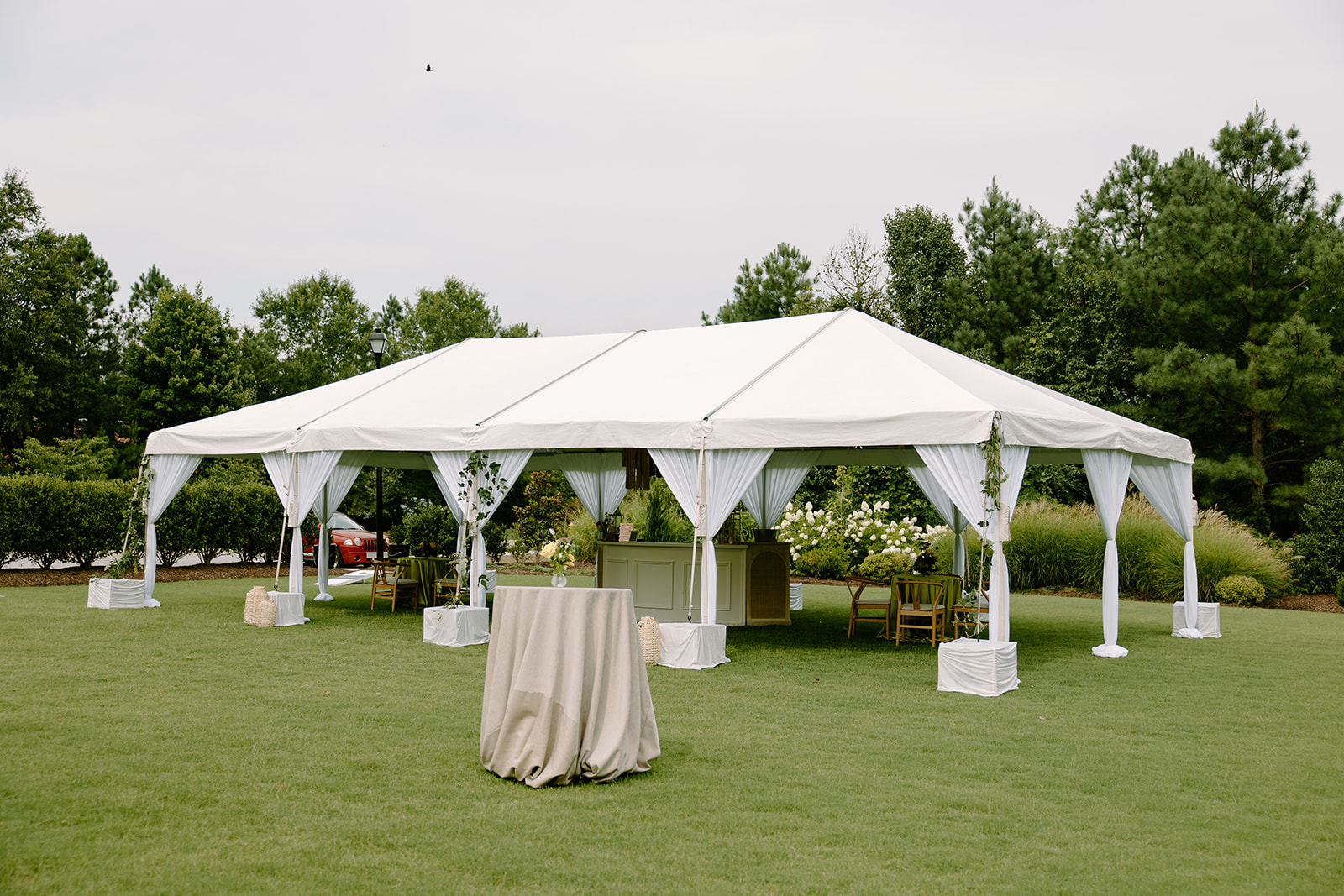 Summer wedding tent captured by Raleigh wedding photographers